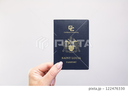 Passport Saint Lucia Held Against Simple White Background. Astana, Kazakhstan, 26 october 2024 122476330
