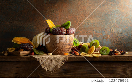 Dried tropical fruits with various nuts and raisins. 122476991