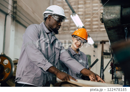 professional engineer worker team working for plant renovate with floorplan building talking professional engineer worker team working for plant renovate with floorplan building talking 122478185
