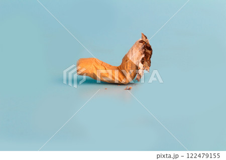 Cigarette butts isolated on blue background 122479155