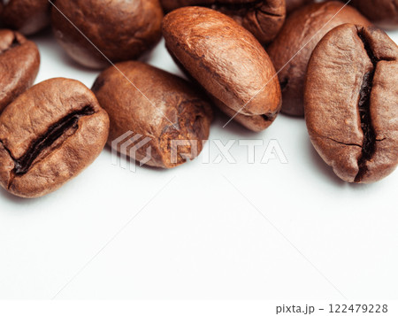 Coffee beans isolated on white background Coffee beans isolated on white background 122479228
