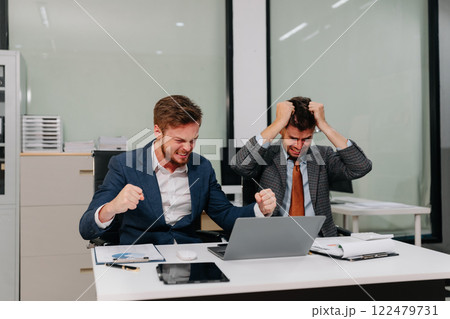 business team sitting stress and worried problems from working in the office. business team sitting stress and worried problems from working in the office. 122479731