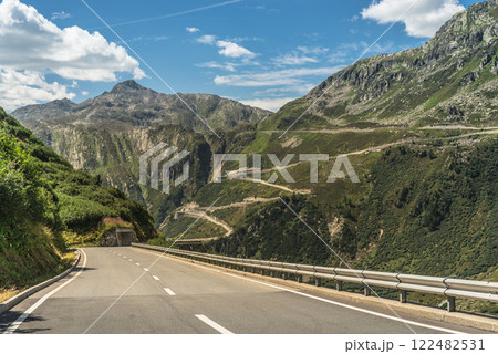 Furka Pass road, in the background the serpentines of the Grimsel Pass road, Canton of Valais, Switzerland Furka Pass road, in the background the serpentines of the Grimsel Pass road, Canton of Valais, Switzerland 122482531