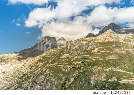 View towards the serpentines of the Furka Pass road in the Swiss Alps, Canton of Valais, Switzerland 122482532