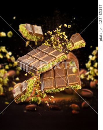 Delicious pistachio chocolate bars 122485337