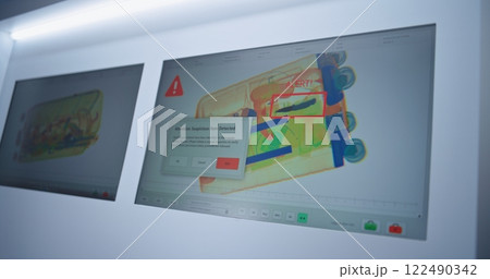 Computer Screens Displaying Modern Software Interface for X-ray Luggage Scanning Computer Screens Displaying Modern Software Interface for X-ray Luggage Scanning 122490342
