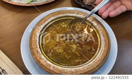 A Close-Up of Traditional Turkish Kelle Paca Soup with Tender Meat A Close-Up of Traditional Turkish Kelle Paca Soup with Tender Meat 122491555