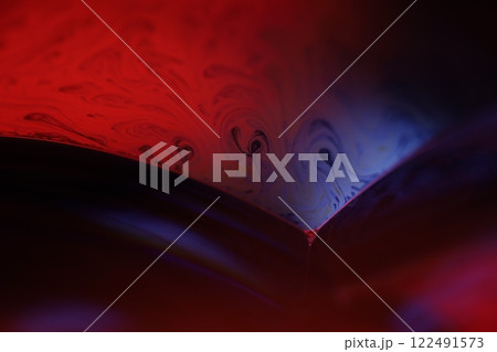 Red reflections of liquid in macro, bubbles in macro, connection of bubbles in macro, cell from liquid, horror background, glossy panels, red on black Red reflections of liquid in macro, bubbles in macro, connection of bubbles in macro, cell from liquid, horror background, glossy panels, red on black 122491573