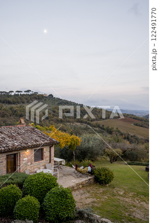 Rustic Countryside Cottage at Dusk 122491770