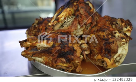 A Platter of Traditional Turkish Kuzu Kelle, Featuring Crispy Lamb Heads A Platter of Traditional Turkish Kuzu Kelle, Featuring Crispy Lamb Heads 122492329