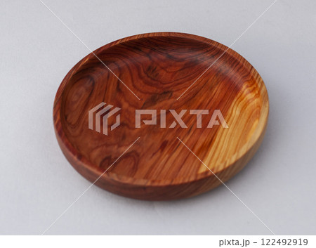 Wooden kitchen utensils stacked view close up isolated Wooden kitchen utensils stacked view close up isolated 122492919
