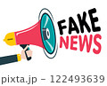 Fake news symbol with megaphone and hand isolated on white background, vector 122493639