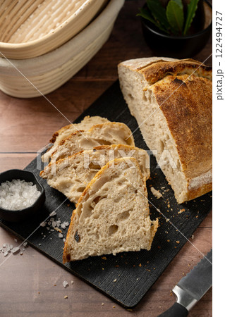 Sourdough homemade bread sliced loaf rustic round craft bread 122494727