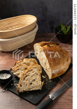 Sourdough homemade bread sliced loaf rustic round craft bread Sourdough homemade bread sliced loaf rustic round craft bread 122494735
