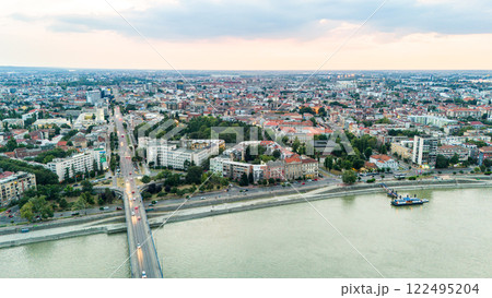 Aerial view of Novi Sad Serbia with city streets Danube river and urban skyline Aerial view of Novi Sad Serbia with city streets Danube river and urban skyline 122495204