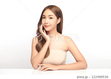 Beautiful young asian woman with clean fresh skin on white background, Face care, Facial treatment, Cosmetology, beauty and spa, Asian women portrait. Beautiful young asian woman with clean fresh skin on white background, Face care, Facial treatment, Cosmetology, beauty and spa, Asian women portrait. 122499530