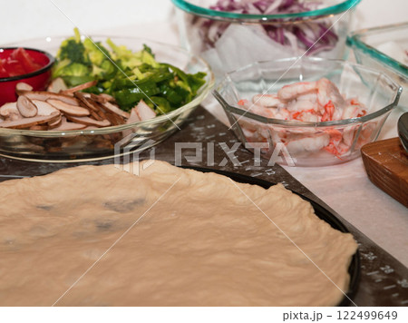 Preparing seafood homemade pizza. close up. 122499649