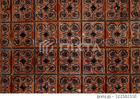 Old vintage ceramic tiles for decoration stoves, wall and floor. Background, texture, seamless pattern Old vintage ceramic tiles for decoration stoves, wall and floor. Background, texture, seamless pattern 122502310