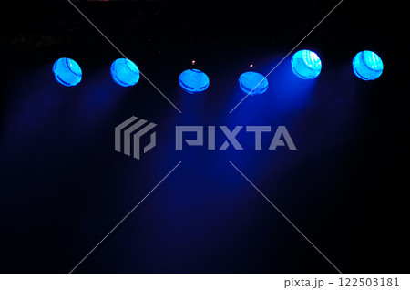 Blue spotlights and smoke 122503181