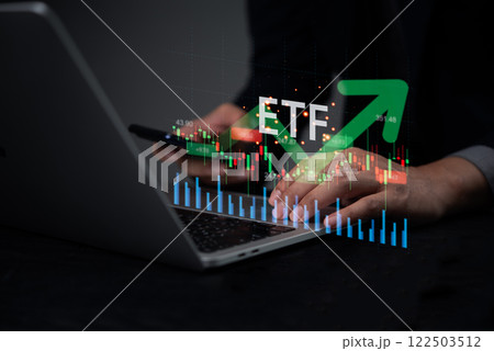 Concept Finance Investment Market Funds ETF and Stocks , Businessman Hand Using Computer Searching Data Business Analysis Exchange Trade Asset Technology 122503512