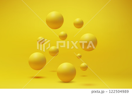 Yellow Spheres Arranged on Bright Yellow Background 122504989