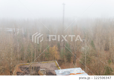 View of ghost town Pripyat at autumn in Chernobyl Exclusion Zone, Ukraine. View from above View of ghost town Pripyat at autumn in Chernobyl Exclusion Zone, Ukraine. View from above 122506347