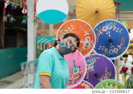 Asian woman work in supermarket or hypermarket 122508617