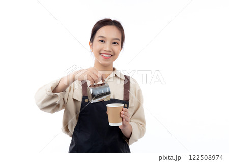 Portrait young asian woman barista work happy holding milk jug pour in coffee cup isolated. 122508974