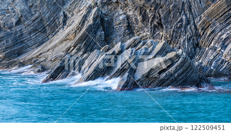 Long exposure of waves and stones on Mediterranean seacoast 122509451