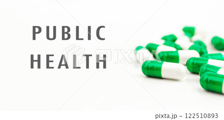 Bunch of pills with the word Public Health written below them Bunch of pills with the word Public Health written below them 122510893