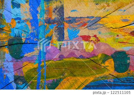 Wooden surface with colorful abstract designs. Wooden surface with colorful abstract designs. 122511105