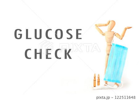 Man is holding a blue mask and the words glucose check are written below him 122511648
