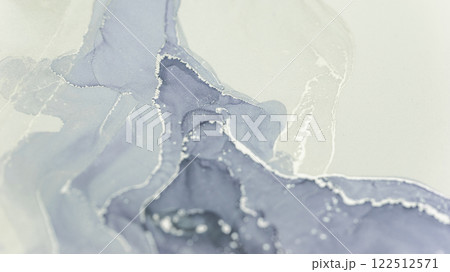 Swirling patterns of alcohol ink create serene abstract art in soft grey and white tones 122512571