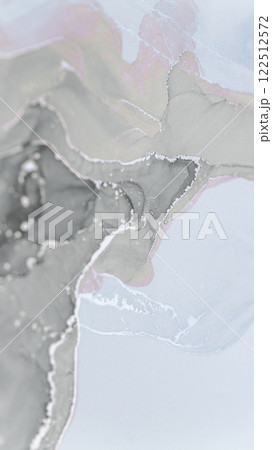 Abstract alcohol ink design with soft gray and white hues creating fluid movement and texture 122512572