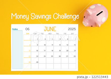 June 2025 calendar and piggy bank. Money savings challenge concepts. 122513443