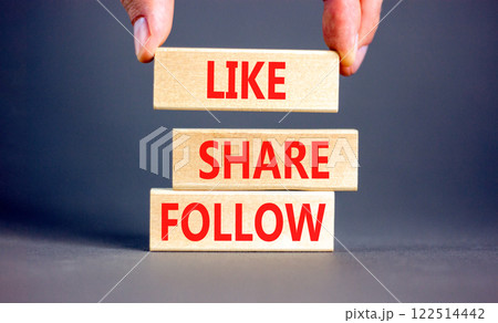 Like share follow symbol. Concept words Like Share Follow on beautiful wooden blocks. Beautiful grey background. Businessman hand. Business like share follow concept. Copy space. Like share follow symbol. Concept words Like Share Follow on beautiful wooden blocks. Beautiful grey background. Businessman hand. Business like share follow concept. Copy space. 122514442