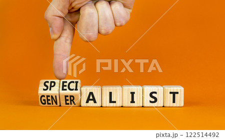 Specialist or globalist symbol. Concept words Specialist Globalist on beautiful wooden blocks. Beautiful orange background. Doctor hand. Business specialist or globalist concept. Copy space 122514492