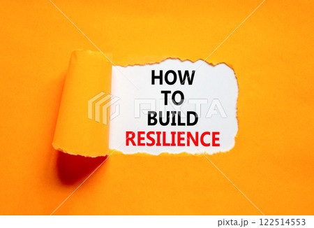 How to build resilience symbol. Concept words How to build resilience on beautiful white paper. Beautiful orange table orange background. Business and how to build resilience concept. Copy space. 122514553