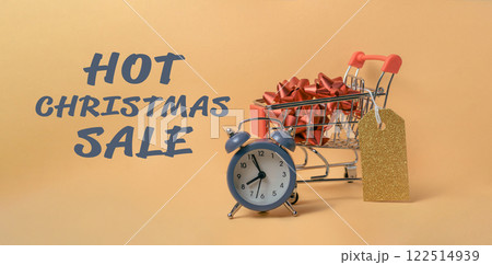Shopping cart with a clock and a gold tag on it Shopping cart with a clock and a gold tag on it 122514939