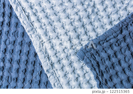 Textile background soft textured cotton fabric in blue tones 122515365
