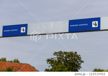Sign in three languages Danish, English and German - Border control. 122515452