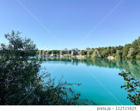 Beautiful lake with a blue sky in the background Beautiful lake with a blue sky in the background 122515625