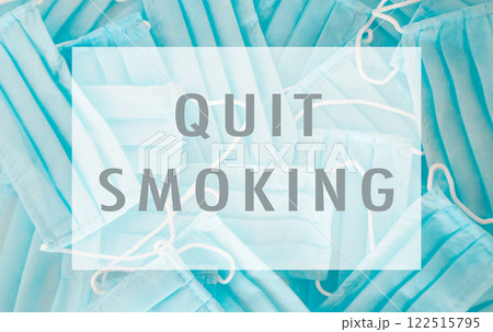 A blue sign with a white border that says Quit Smoking 122515795