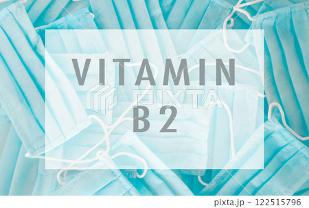Blue background with a white and blue word that says vitamin b2 122515796