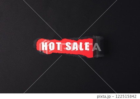 Red sign with the word HOT sale written on it 122515842