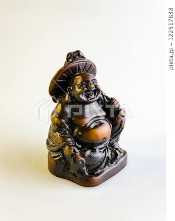 Figurine of a funny, laughing and cheerful golden copper Buddha or Hotei Figurine of a funny, laughing and cheerful golden copper Buddha or Hotei 122517838