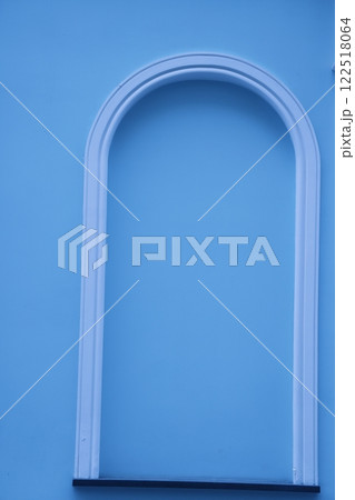 False window in a plastered wall, altered color scheme, architectural background in pastel colors. 122518064
