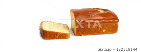 Deliciously moist homemade cake with a golden glaze and a slice cut, perfect for dessert or tea time 122518144
