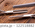 Professional Hairdressing Tools - Scissors and Comb in Minimalist Style 122518882