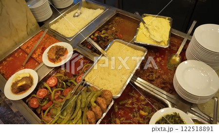 A Culinary Array of Traditional Turkish Dishes, Meats, Vegetables, and White Rice A Culinary Array of Traditional Turkish Dishes, Meats, Vegetables, and White Rice 122518891